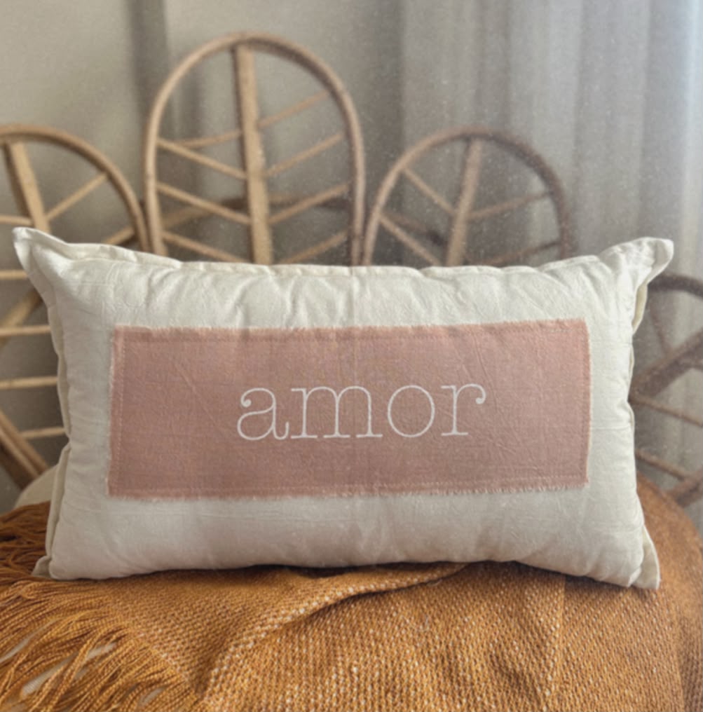 almohadon con flase rosa